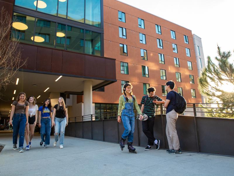 Students socializing outside of Olympic and Centennial Residence Halls
