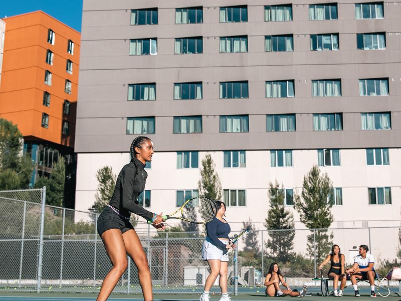 Students playing tennis