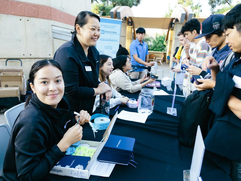 Students at a booth